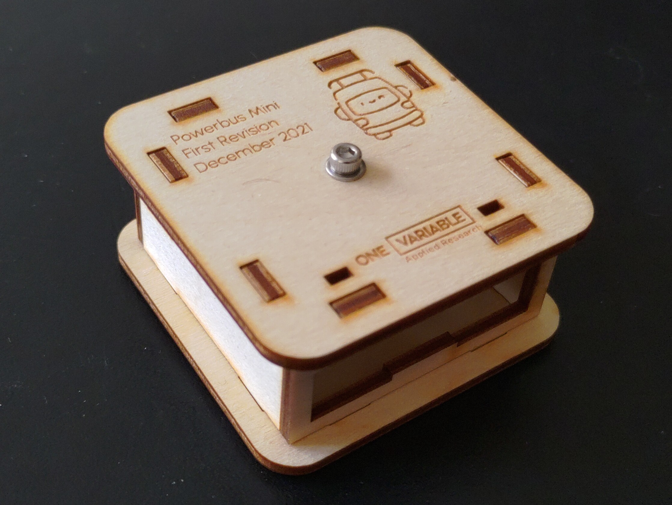 A laser-cut wooden case, assembled